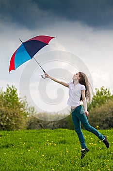 Girl with colored umbrella