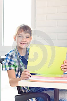 The girl communicates via video communication with friends during the quarantine period, was distracted and looked into the frame