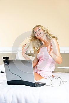 Girl communicating using a web camera