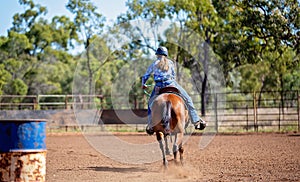 Girl Competing In Barrel Racing At Outback Country Rodeo