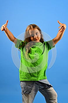 Girl with confident face on blue background