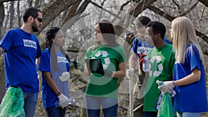 Girl coordinating group of volunteers