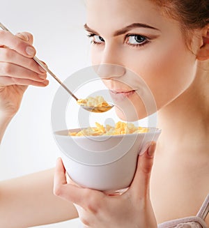 Girl with corn flakes photo