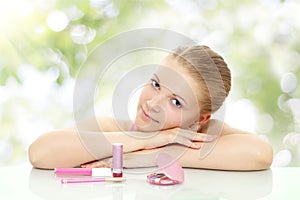 Girl with cosmetics