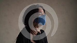 Girl coughs in mask, 4k