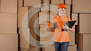Girl courier in orange uniform delivering a parcel to wrong address. Error or inaccuracy concept, 4K video