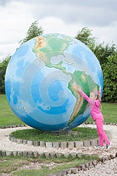 Girl covers the globe