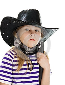 Girl cowboy in a black hat