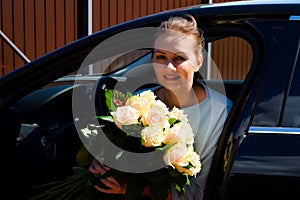 Girl with cream roses. A bouquet of roses for mom. Wedding proposal