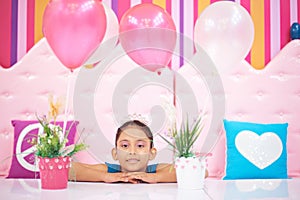 Girl with crown in birthday party