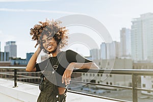 Girl with curly hair at a LA rooftop