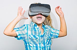 Girl cute child with head mounted display on white background. Virtual reality concept. Small kid use modern technology