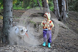 Girl and cute dusty dog.