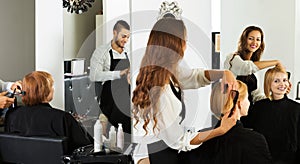Girl cuts hair at the hair salon