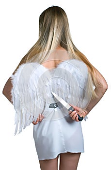 Girl cuts off the white angel wings