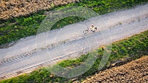 Girl cycling. Aerial view