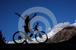 Girl cycling at the road