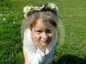 Girl with daisy chain on head