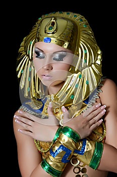 The girl-dancer in a costume of the Pharaoh