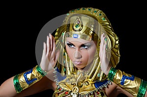 The girl-dancer in a costume of the Pharaoh