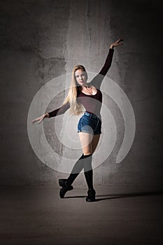 Girl dancer in an elegant, unusual pose.healthy lifestyle, Life in Art, a great body, choreography