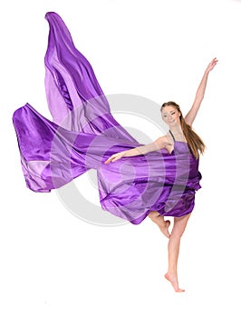 Girl dancer in flying dress