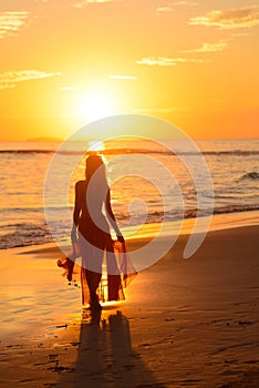 Girl dancing on the beach at sunset,mexico 3