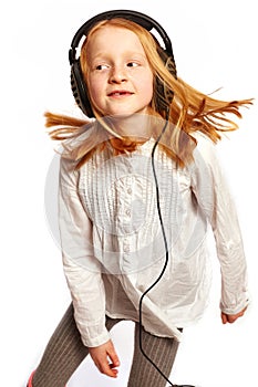 Girl dancing with headphones
