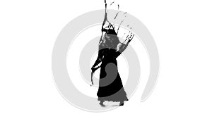 Girl is dancing with a manton . White background. Silhouette. Slow motion