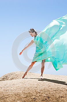 Girl dancing in the wind