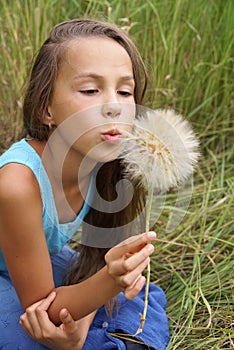 Girl with dandelion