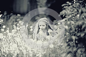 Girl in dandelion field
