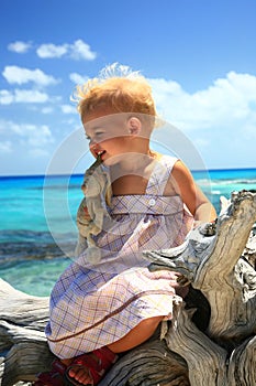 Girl on a dead tree