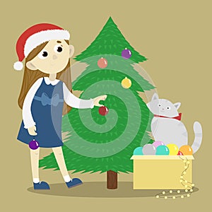 Girl decorates the Chistmas tree