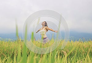 A Girl Deep Breathing in the Rice Field