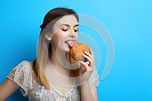 Girl with a delicious sweet bun