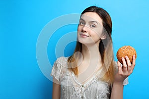 Girl with a delicious sweet bun