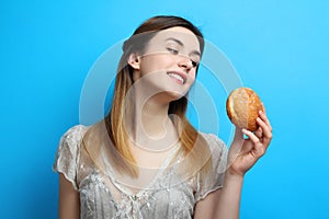 Girl with a delicious sweet bun