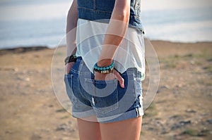 Girl in denim short shorts