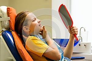 Girl on dental appointment. Regular check up teeth