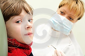 Girl at a dentist examination