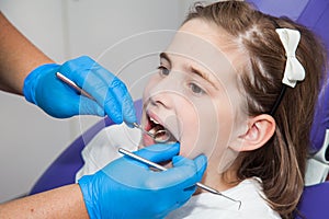 Girl at a dentist examination