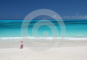 Girl on the desrt beach