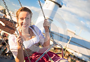 Girl with dirndl does oktoberfest wiesn in munic