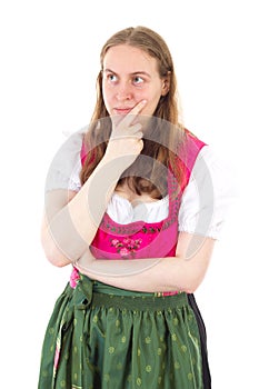 Girl in dirndl giving thought to her future