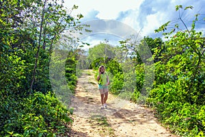 Girl on dirt road