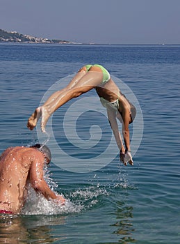 Girl diveing in sea