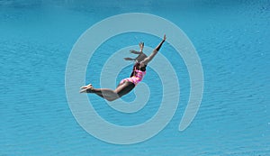 Girl Diving Into Beautiful Blue Water