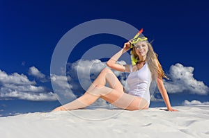 Girl with diving mask on the beach