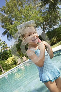 Girl With Diving Mask And Snorkel At Poolside